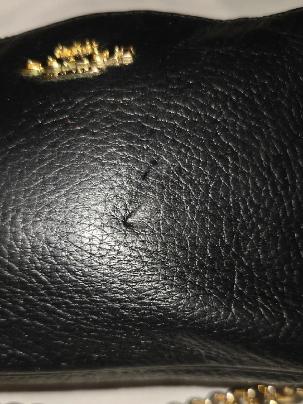 Coach Black Leather Mini Wristlet with Gold Chain 8' L x 5' H.